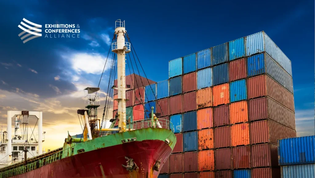 ship docked near stacked containers and ECA logo in upper left corner